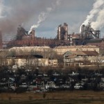 Smoke billows from the chimneys of the Ilycha steelworks in the industrial city of Mariupol in eastern Ukraine