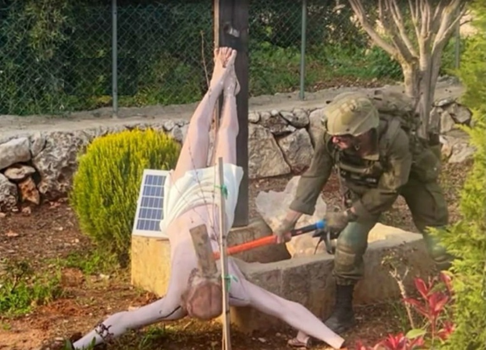 <b><span style='color:#bc2929;font-size:16px;'>Global Outrage <br></span>Israeli Soldier Smashes Jesus Statue in Lebanon</b>
